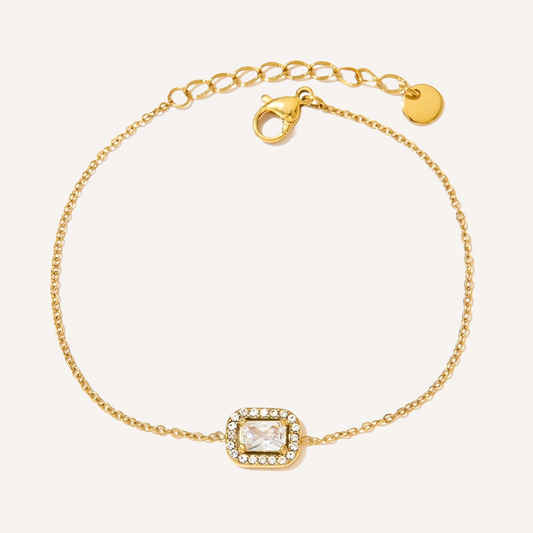 Elegantes feines gold Armband mit einem dünnen Kettchen und Rechteckigem Zirkonia mit Halo. 