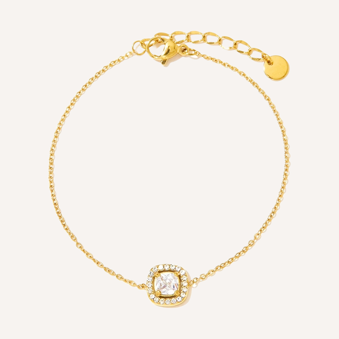 Elegantes feines gold Armband mit einem dünnen Kettchen und viereckigem Zirkonia mit Halo. 