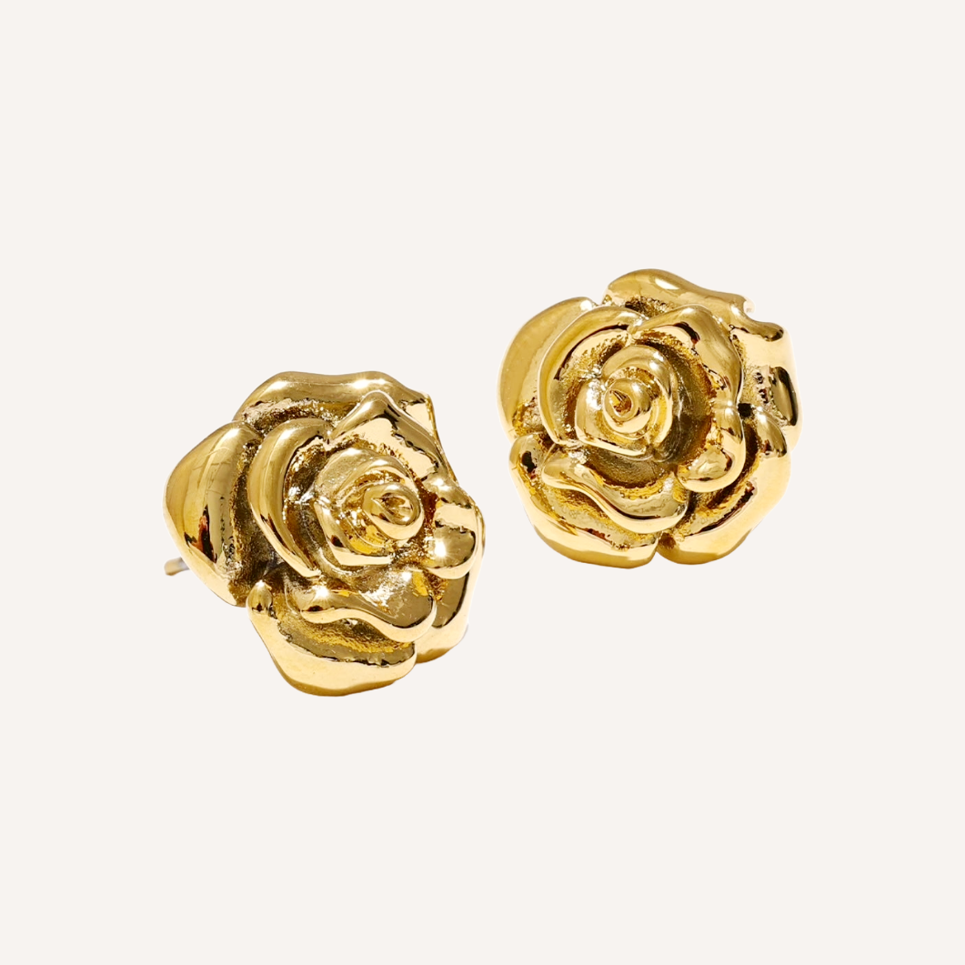 Gold earrings shaped like a rose. The perfect forever rose.